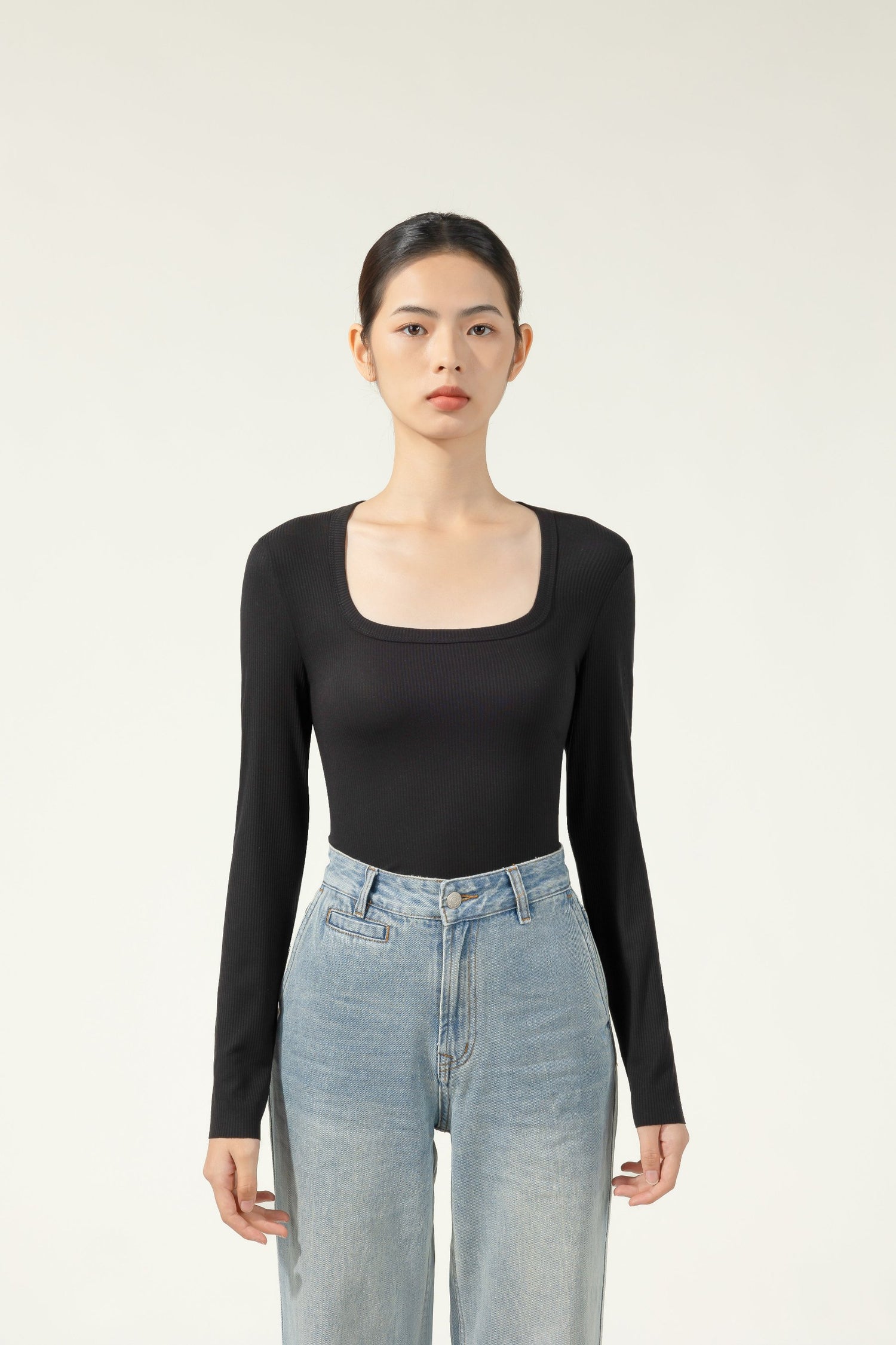 Introducing the Black Acrylic Long Sleeve U-Neck Thermal Top by Hikesity. Warmth is woven into every extra fine, antibacterial fiber.