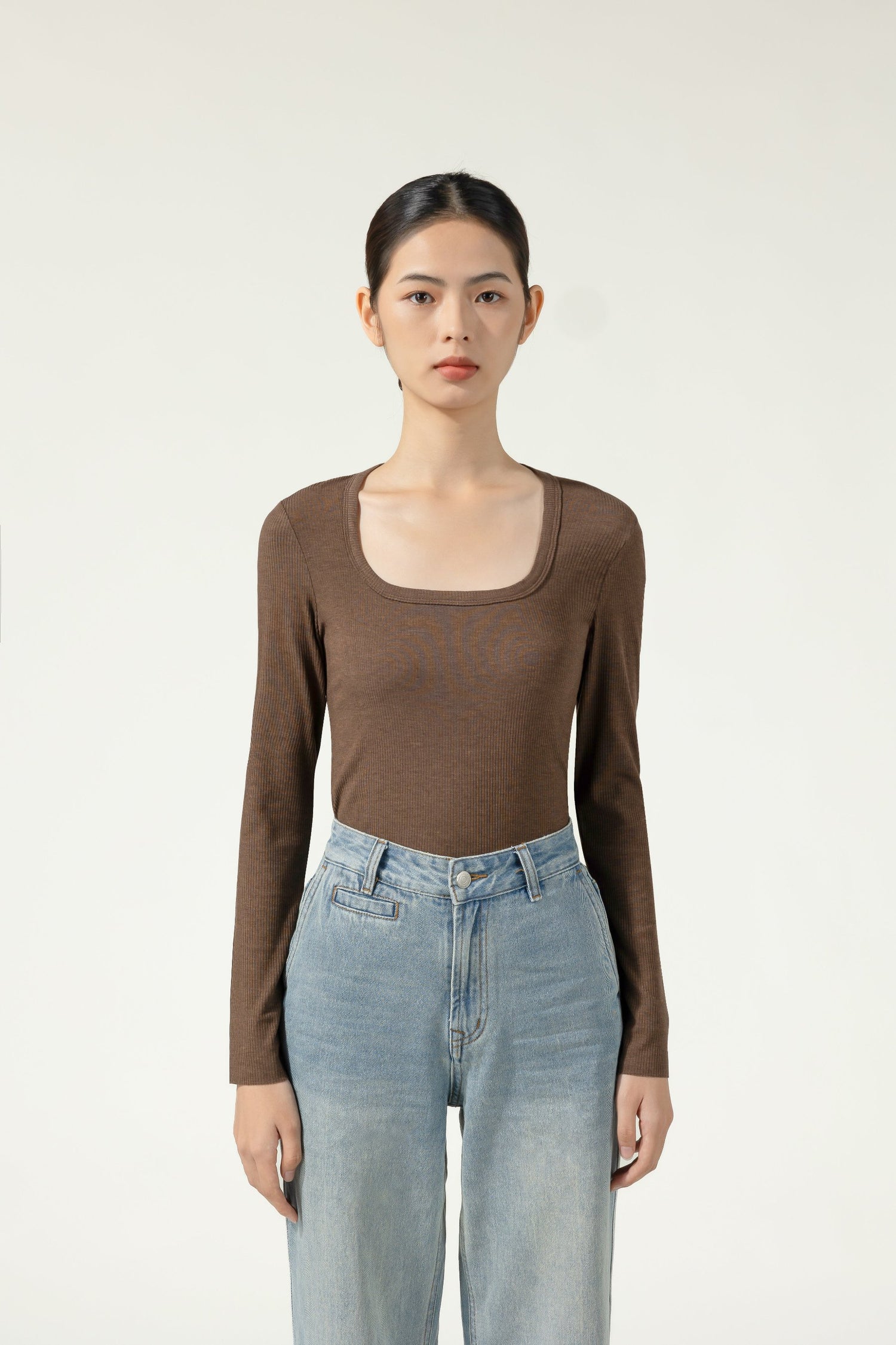 Introducing the Brown Acrylic Long Sleeve U-Neck Thermal Top by Hikesity. Warmth is woven into every extra fine, antibacterial fiber.
