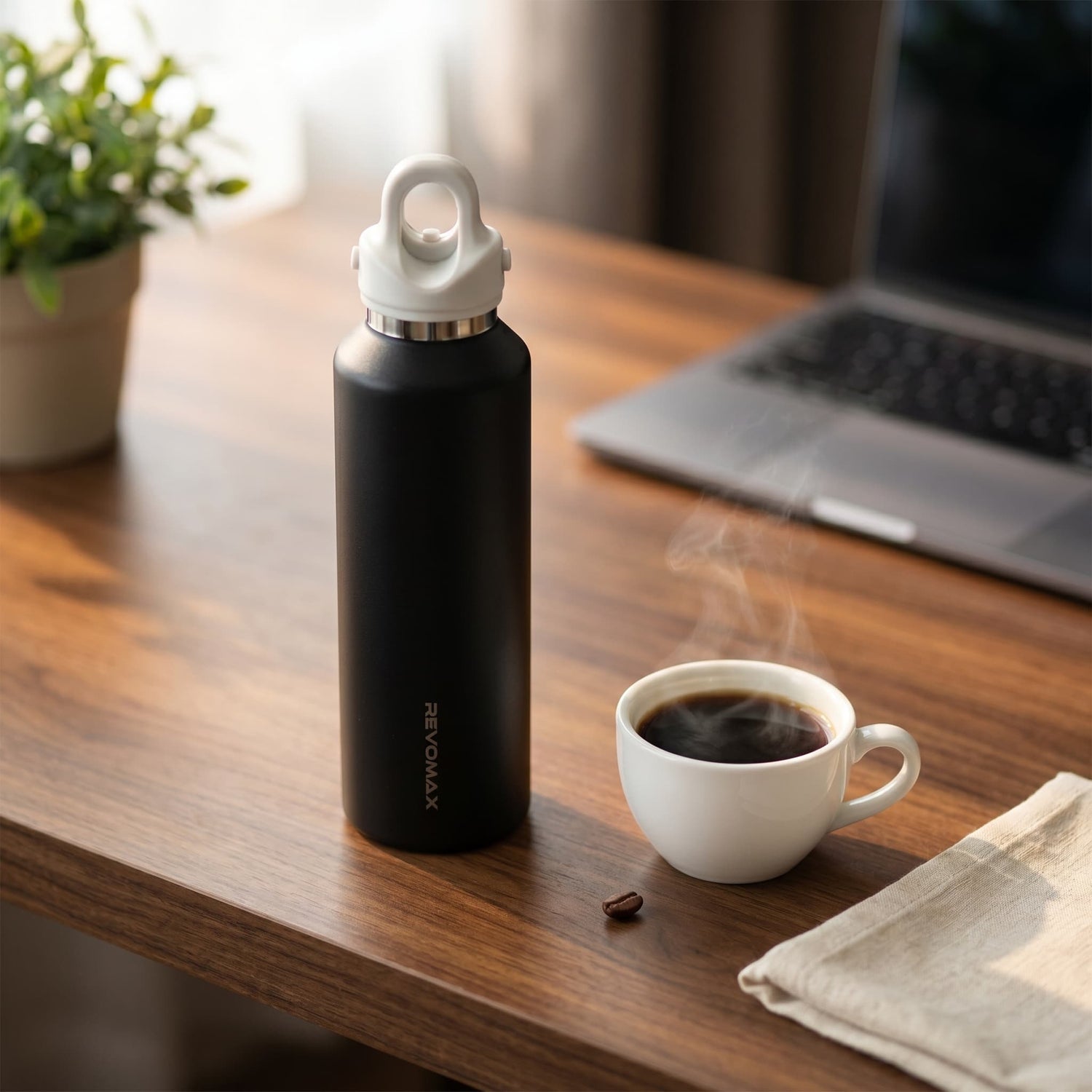 Hikesity 20oz 316L threadless coffee bottle on a morning coffee desk — the best water bottle for coffee in 2026
