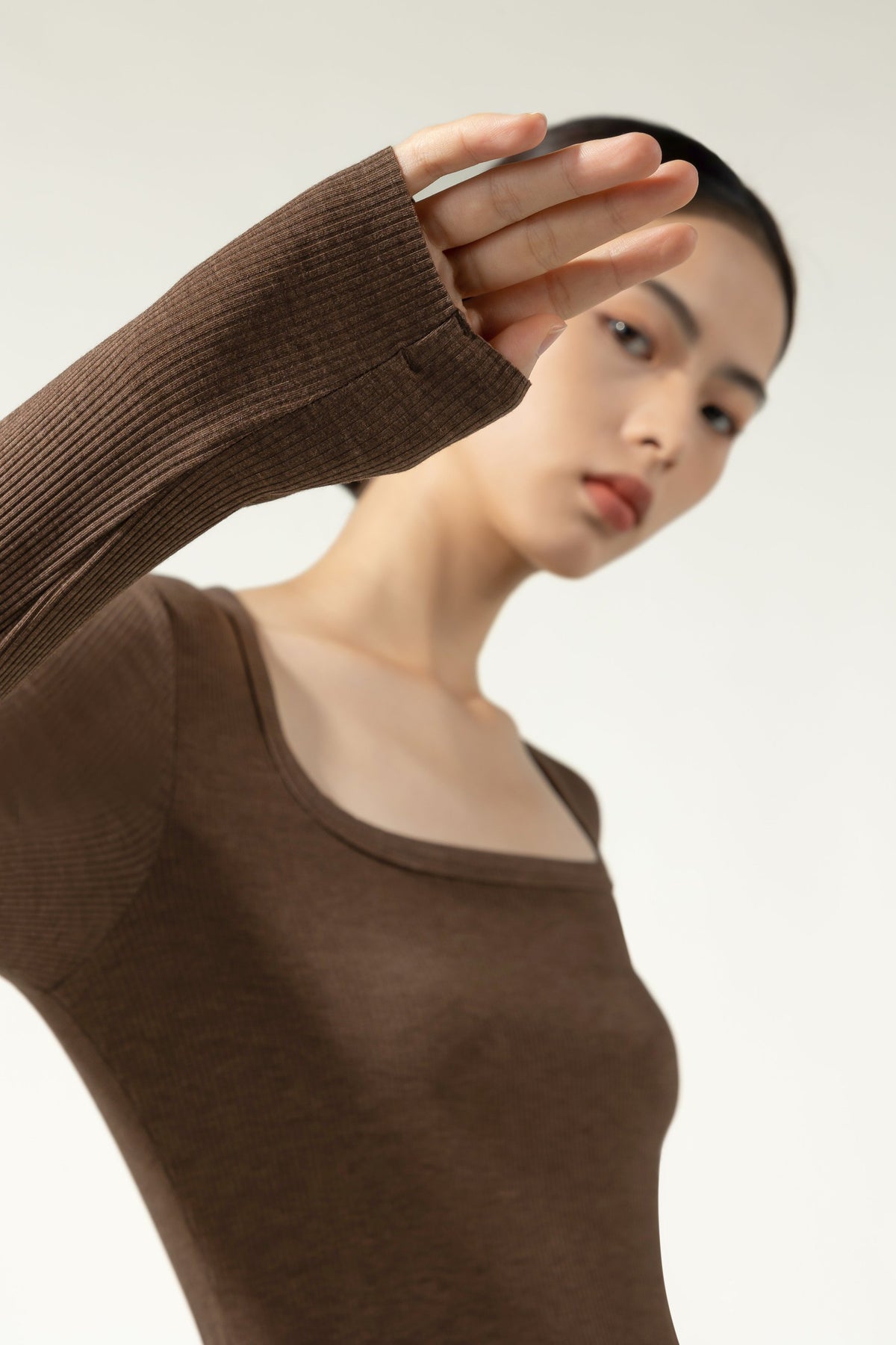 Introducing the Brown Acrylic Long Sleeve U-Neck Thermal Top by Hikesity. Warmth is woven into every extra fine, antibacterial fiber. 