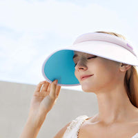 Classic Wide Brim UV Protection Sun Visor: Blocks 99.9% of UV rays without blocking your vision; Available in black and pink. 