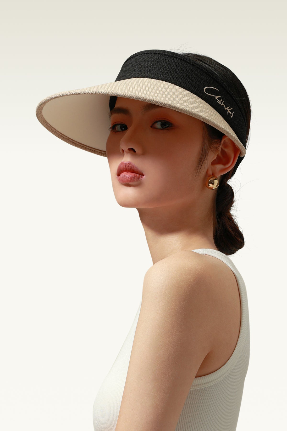 This is a sun hat with a highly customized "Chanel Style" fabric and cool ice silk fabric, blocks 99%+ ultraviolet rays, all while maintaining a look and sense of luxury.