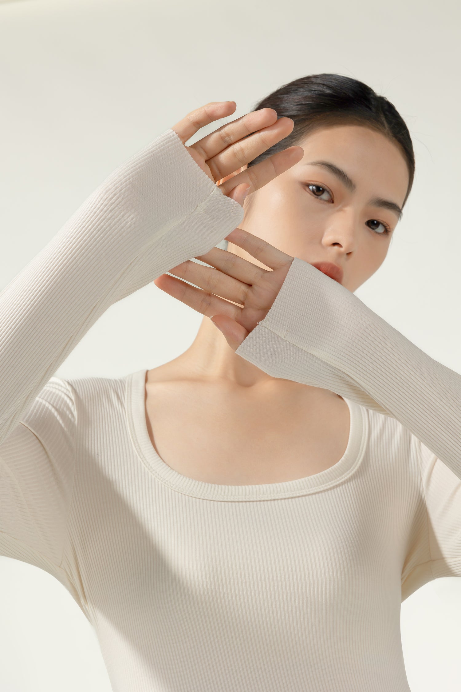 Introducing the White Acrylic Long Sleeve U-Neck Thermal Top by Hikesity. Warmth is woven into every extra fine, antibacterial fiber.