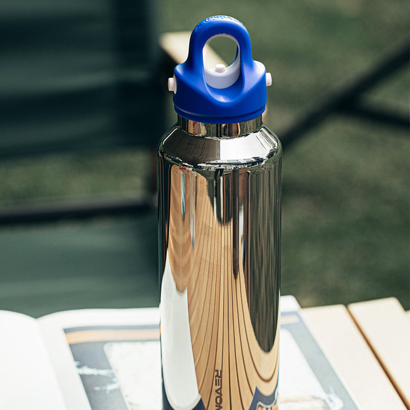 Hikesity's innovative, no-screw design water bottle with a limited edition design. With a Klein blue lid that can be opened with one hand and a sleek, silver bottle; Available in 20 oz or 32 oz sizes.